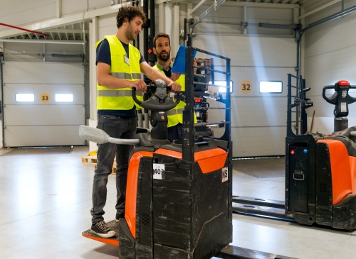 Forklift Operators working together and training each other