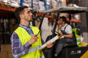 Warehouse Material Handler Checking Inventory