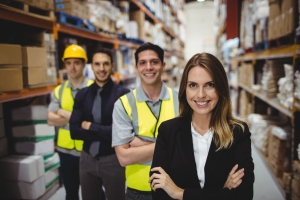 Warehouse Manager and Workers Posing Together