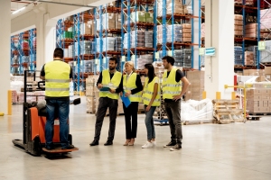Expert Providing Forklift Training to Warehouse Order Selectors